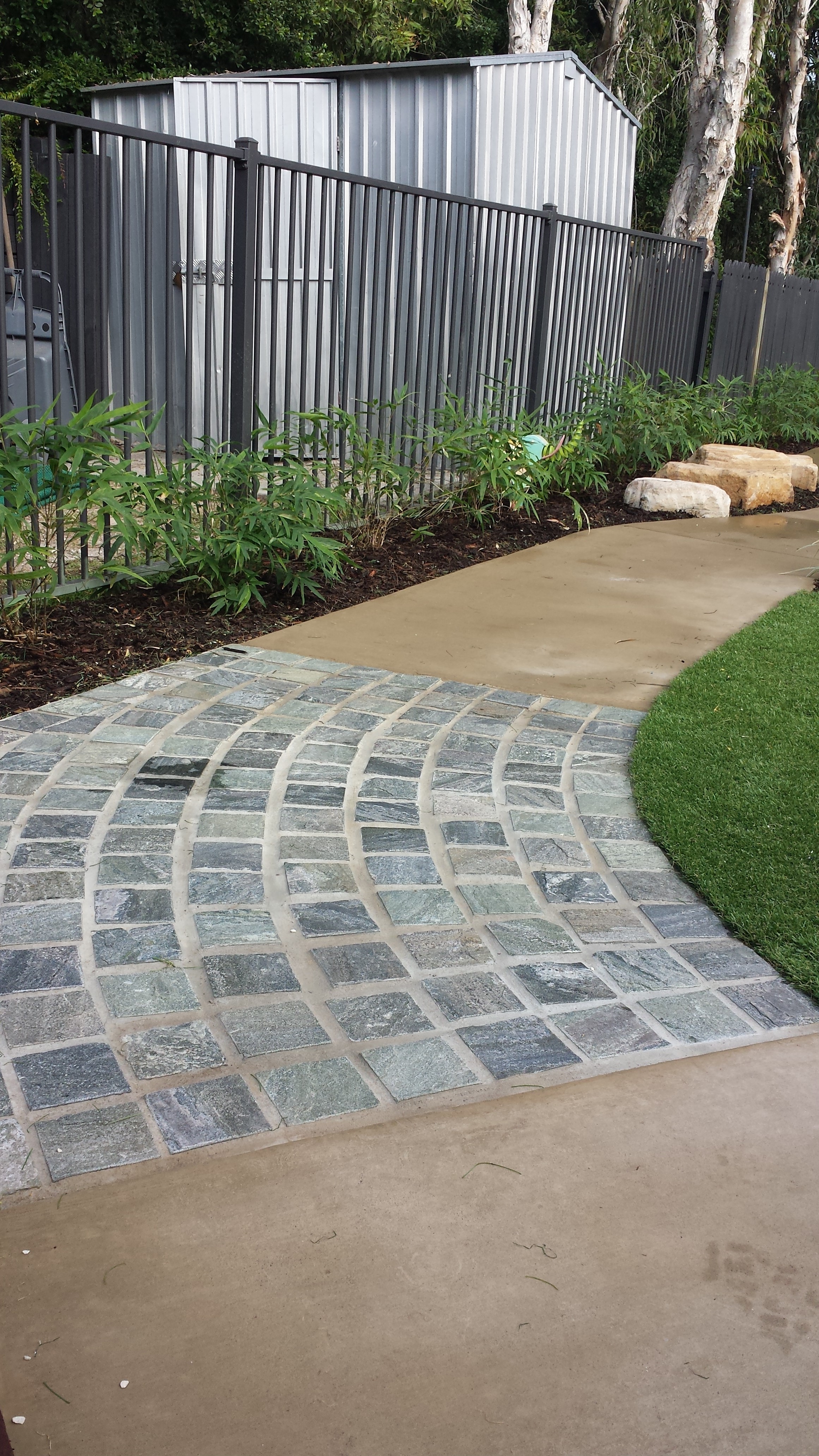 Coloured (Camel) concrete with feature cobblestone