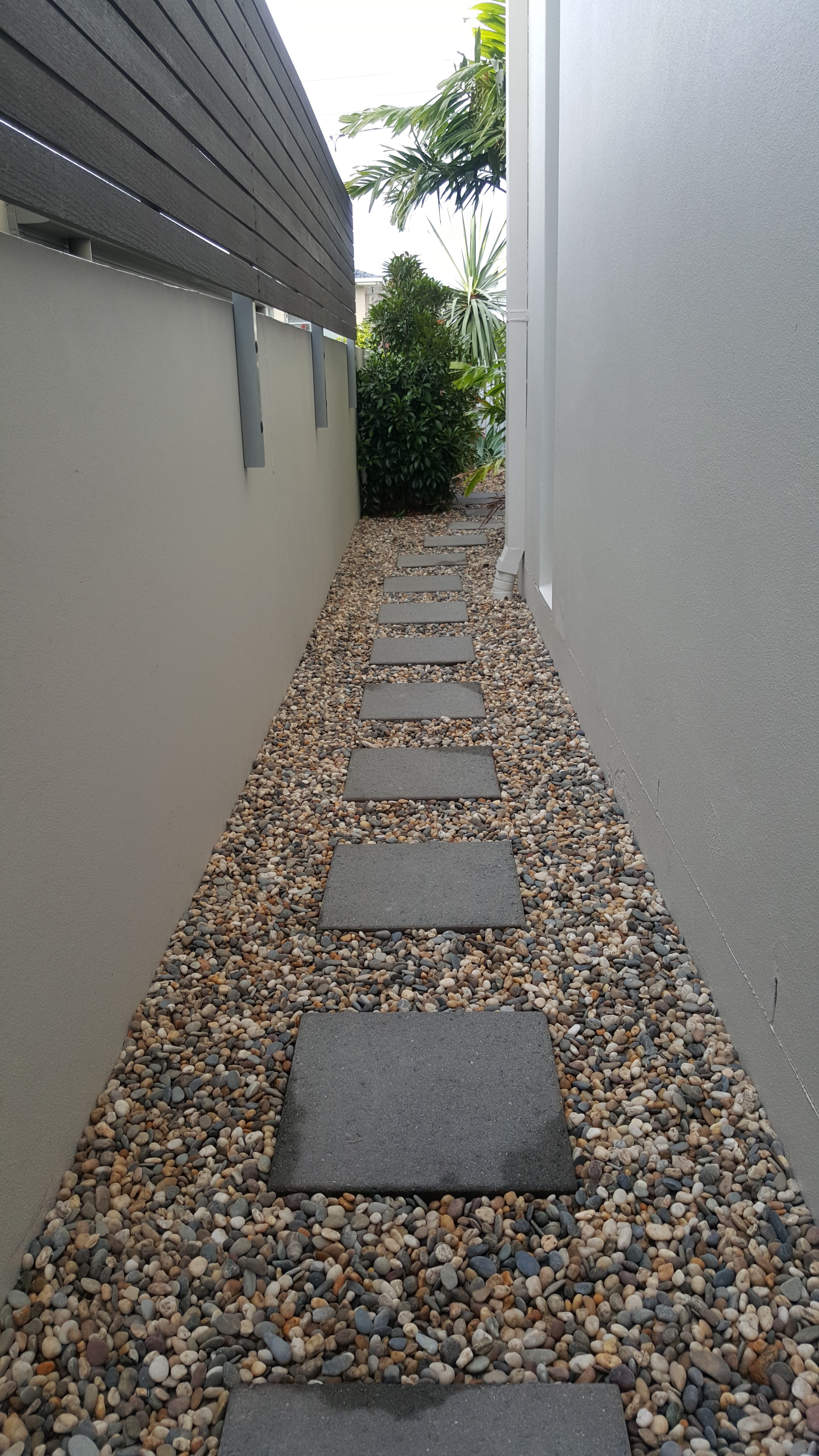 Concrete 400mm pavers with Nambucca pebble