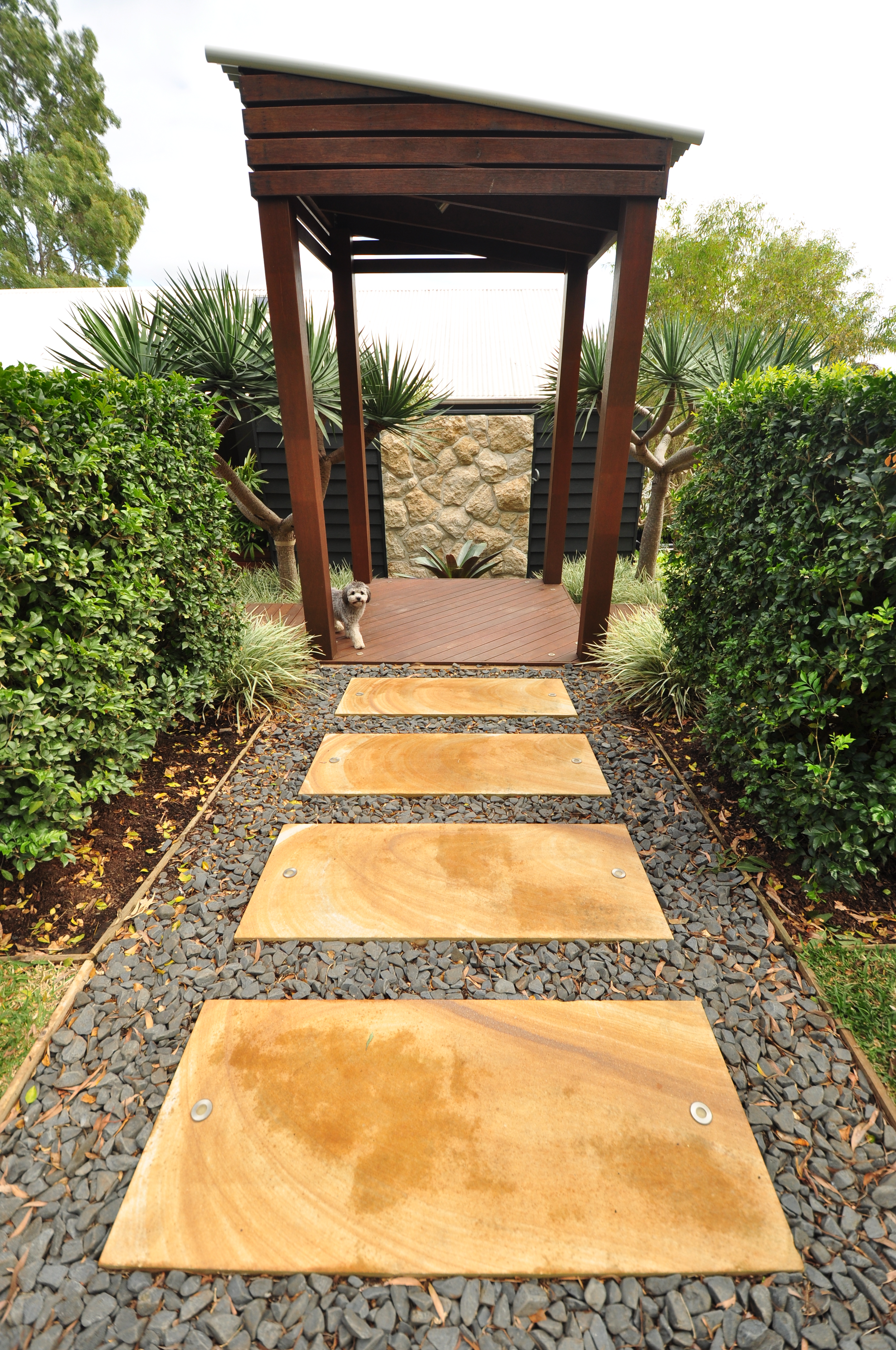 Australian Sandstone steppers with 40mm grey river pebble surrounds